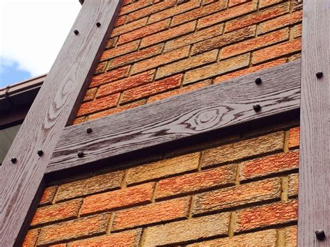 mock tudor wood replacement|cost to replace mock tudor board.